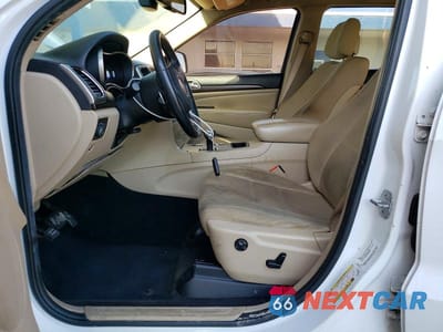 Zdjęcie 7 z 13 samochodu: 2014 JEEP GRAND CHEROKEE LAREDO VIN:1C4RJEAG8EC433097 - miniatura