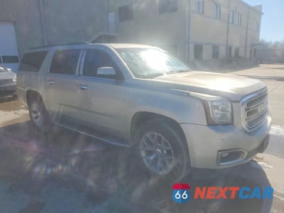 Czwarte zdjęcie samochodu z boku: 2015 GMC YUKON XL C1500 SLT VIN:1GKS1HKC9FR252222 - miniatura