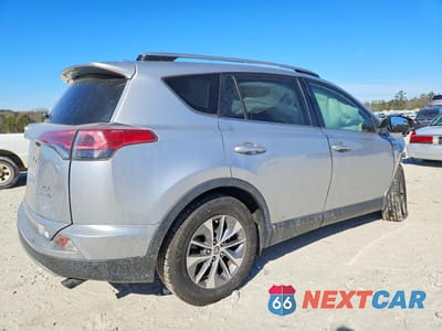 Trzecie zdjęcie samochodu z tyłu: 2018 TOYOTA RAV4 HV LE VIN:JTMRJREV3JD175348 - miniatura