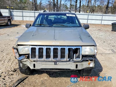 Piąte zdjęcie samochodu w środku: 1998 JEEP GRAND CHEROKEE LAREDO VIN:1J4FX58S3WC281298 - miniatura