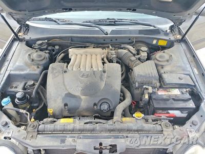 Zdjęcie 11 z 11 samochodu: 2002 HYUNDAI SONATA BASE VIN:KMHWF25HX2A719980 - miniatura