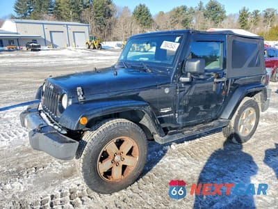 2010 JEEP WRANGLER SAHARA 1J4AA5D19AL137210 - główne zdjęcie licytacji z USA - miniatura