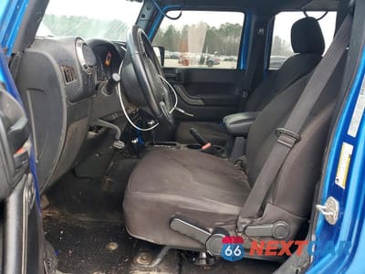 Zdjęcie 7 z 11 samochodu: 2015 JEEP WRANGLER UNLIMITED SPORT VIN:1C4BJWDG2FL648785 - miniatura