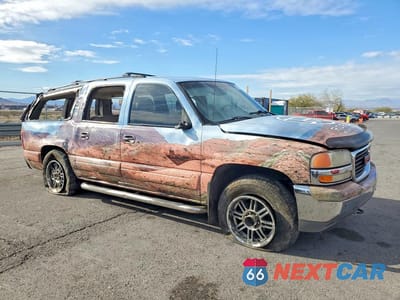 Czwarte zdjęcie samochodu z boku: 2001 GMC YUKON XL K1500 VIN:3GKFK16T61G147467 - miniatura