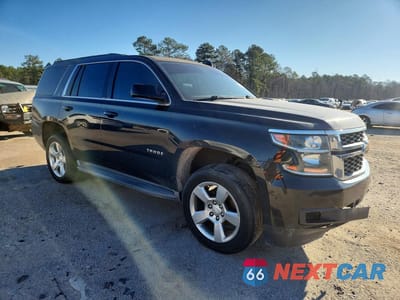 Czwarte zdjęcie samochodu z boku: 2015 CHEVROLET TAHOE K1500 VIN:1GNSKBKCXFR578298 - miniatura