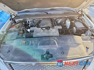 Zdjęcie 12 z 12 samochodu: 2016 GMC YUKON XL DENALI VIN:1GKS2HKJ4GR201210 - miniatura