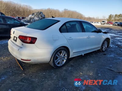 Trzecie zdjęcie samochodu z tyłu: 2017 VOLKSWAGEN JETTA SEL VIN:3VWL17AJ1HM303367 - miniatura