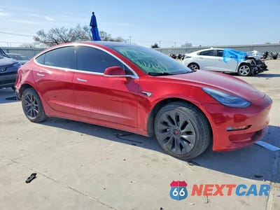 Czwarte zdjęcie samochodu z boku: 2019 TESLA MODEL 3 VIN:5YJ3E1EB8KF193923 - miniatura
