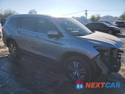 Czwarte zdjęcie samochodu z boku: 2017 HONDA PILOT EXL VIN:5FNYF6H52HB082525 - miniatura