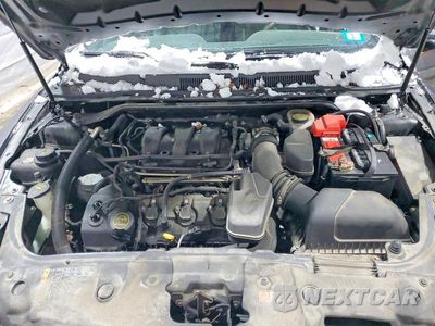 Zdjęcie 11 z 12 samochodu: 2018 FORD TAURUS SEL VIN:1FAHP2H82JG110776 - miniatura
