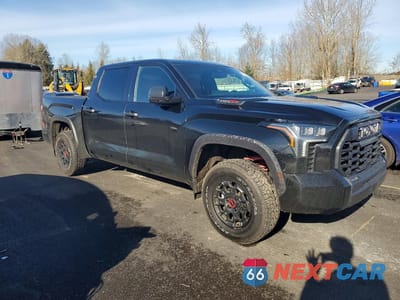 Czwarte zdjęcie samochodu z boku: 2024 TOYOTA TUNDRA TRD PRO HV VIN:5TFPC5DB2RX059540 - miniatura