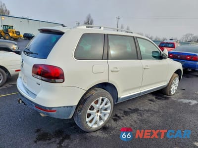 Trzecie zdjęcie samochodu z tyłu: 2009 VOLKSWAGEN TOUAREG 2 V6 TDI VIN:WVGFM77L39D033213 - miniatura