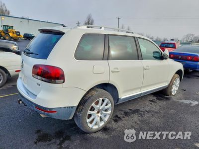 Trzecie zdjęcie samochodu z tyłu: 2009 VOLKSWAGEN TOUAREG 2 V6 TDI VIN:WVGFM77L39D033213 - miniatura