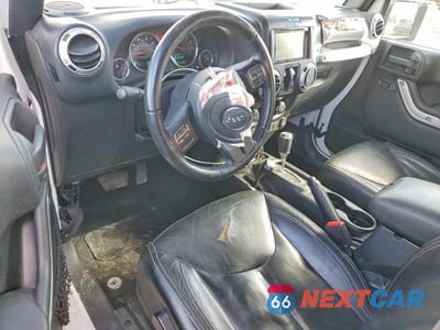 Zdjęcie 8 z 12 samochodu: 2016 JEEP WRANGLER SAHARA VIN:1C4AJWBGXGL145828 - miniatura