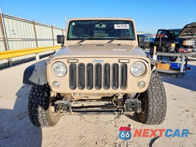 Piąte zdjęcie samochodu w środku: 2016 JEEP WRANGLER UNLIMITED SPORT VIN:1C4BJWKG9GL266399 - miniatura