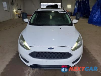 Piąte zdjęcie samochodu w środku: 2017 FORD FOCUS SEL VIN:1FADP3M2XHL248802 - miniatura