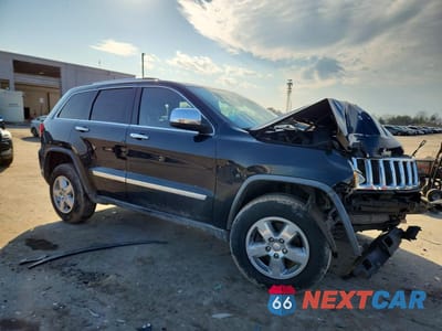 Czwarte zdjęcie samochodu z boku: 2011 JEEP GRAND CHEROKEE LAREDO VIN:1J4RR4GG0BC670456 - miniatura