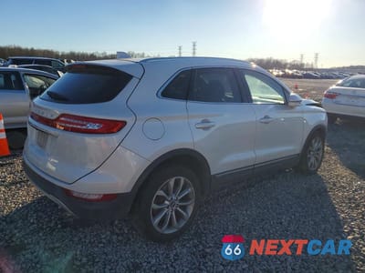 Trzecie zdjęcie samochodu z tyłu: 2019 LINCOLN MKC SELECT VIN:5LMCJ2C92KUL04290 - miniatura