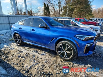 Czwarte zdjęcie samochodu z boku: 2020 BMW X6 M50I VIN:5UXCY8C05L9B07238 - miniatura