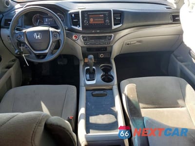 Zdjęcie 8 z 12 samochodu: 2016 HONDA PILOT LX VIN:5FNYF6H11GB110441 - miniatura