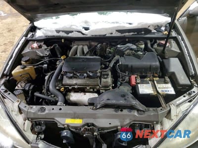Zdjęcie 11 z 11 samochodu: 2003 TOYOTA CAMRY LE VIN:4T1BF32K53U548219 - miniatura