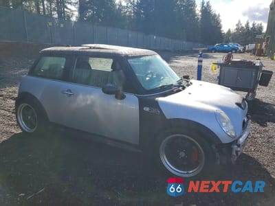 Czwarte zdjęcie samochodu z boku: 2002 MINI COOPER S VIN:WMWRE33462TD55099 - miniatura