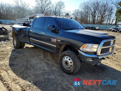 Czwarte zdjęcie samochodu z boku: 2018 RAM 3500 SLT VIN:3C63RRHJ0JG300095 - miniatura
