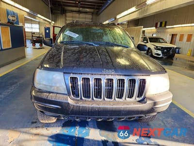 Piąte zdjęcie samochodu w środku: 2002 JEEP GRAND CHEROKEE LIMITED VIN:1J4GW58NX2C272996 - miniatura