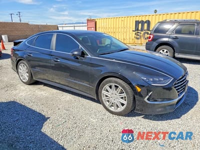 Czwarte zdjęcie samochodu z boku: 2022 HYUNDAI SONATA HYBRID LIMITED VIN:KMHL54JJ3NA052524 - miniatura