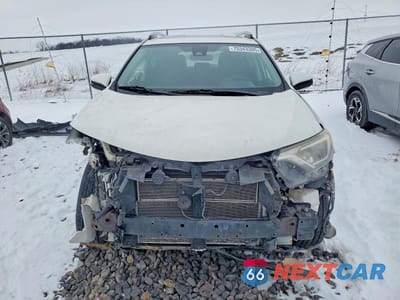 Piąte zdjęcie samochodu w środku: 2017 TOYOTA RAV4 HYBRID XLE VIN:JTMRJREV8HD142159 - miniatura