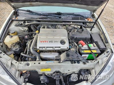 Zdjęcie 11 z 12 samochodu: 2004 TOYOTA CAMRY LE V6 VIN:4T1BF30K74U586328 - miniatura