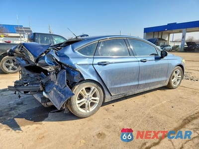 Trzecie zdjęcie samochodu z tyłu: 2018 FORD FUSION SE VIN:3FA6P0HD1JR149571 - miniatura