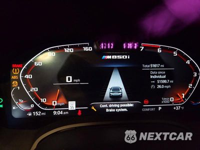 Zdjęcie 9 z 11 samochodu: 2021 BMW M850XI VIN:WBAGV8C02MCG14191 - miniatura