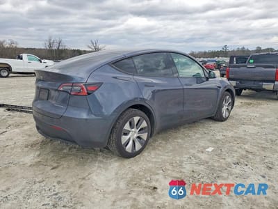 Trzecie zdjęcie samochodu z tyłu: 2023 TESLA MODEL Y VIN:7SAYGDEE8PA191124 - miniatura