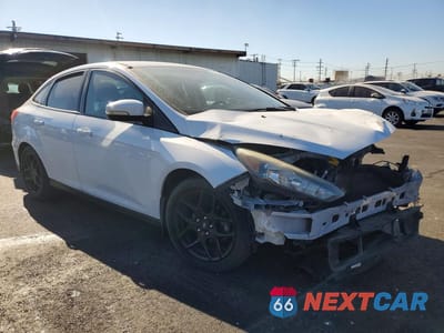 Czwarte zdjęcie samochodu z boku: 2016 FORD FOCUS SE VIN:1FADP3F20GL362755 - miniatura