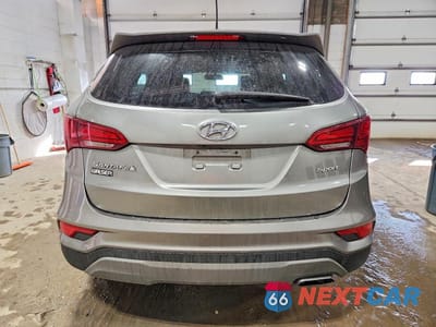 Zdjęcie 6 z 12 samochodu: 2018 HYUNDAI SANTA FE SPORT VIN:5NMZT3LB6JH073601 - miniatura