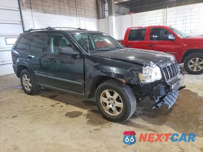 Czwarte zdjęcie samochodu z boku: 2009 JEEP GRAND CHEROKEE LAREDO VIN:1J8GR48K99C519814 - miniatura