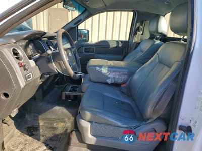 Zdjęcie 7 z 12 samochodu: 2014 FORD F150 VIN:1FTMF1CM4EKD62977 - miniatura