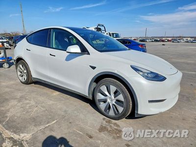Czwarte zdjęcie samochodu z boku: 2023 TESLA MODEL Y VIN:7SAYGDEE3PA119389 - miniatura
