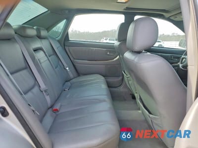 Zdjęcie 10 z 12 samochodu: 2003 TOYOTA AVALON XL VIN:4T1BF28B63U269637 - miniatura