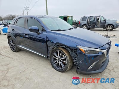 Czwarte zdjęcie samochodu z boku: 2018 MAZDA CX-3 GRAND TOURING VIN:JM1DKFD7XJ0310681 - miniatura