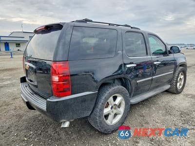 Trzecie zdjęcie samochodu z tyłu: 2014 CHEVROLET TAHOE C1500 LTZ VIN:1GNSCCE01ER156553 - miniatura