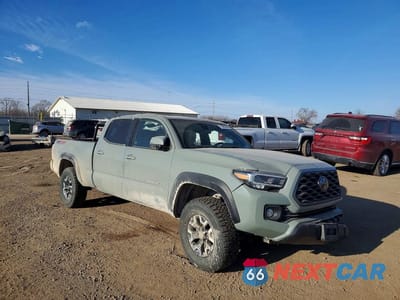 Czwarte zdjęcie samochodu z boku: 2022 TOYOTA TACOMA DOUBLE CAB VIN:3TMDZ5BN5NM139929 - miniatura