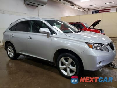 Czwarte zdjęcie samochodu z boku: 2010 LEXUS RX 350 BASE VIN:2T2BK1BA8AC071691 - miniatura