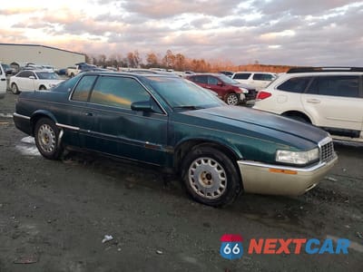 Czwarte zdjęcie samochodu z boku: 1993 CADILLAC ELDORADO VIN:1G6EL12B7PU615023 - miniatura