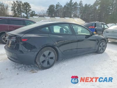 Trzecie zdjęcie samochodu z tyłu: 2021 TESLA MODEL 3 VIN:5YJ3E1EB9MF853079 - miniatura