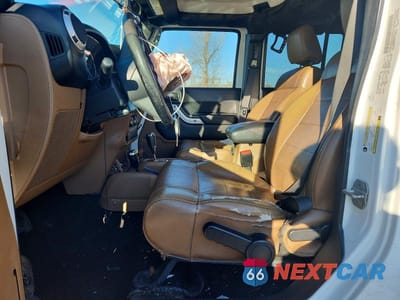 Zdjęcie 7 z 12 samochodu: 2012 JEEP WRANGLER UNLIMITED SAHARA VIN:1C4BJWEG6CL186516 - miniatura