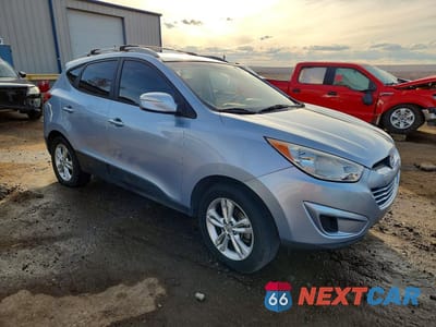 Czwarte zdjęcie samochodu z boku: 2012 HYUNDAI TUCSON GLS VIN:KM8JU3AC4CU536655 - miniatura