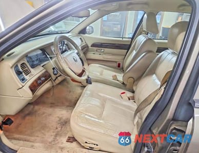 Zdjęcie 7 z 11 samochodu: 2006 MERCURY GRAND MARQUIS LS VIN:2MEFM75W26X644953 - miniatura