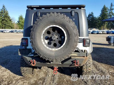 Zdjęcie 6 z 13 samochodu: 2010 JEEP WRANGLER UNLIMITED RUBICON VIN:1J4HA6H16AL119021 - miniatura